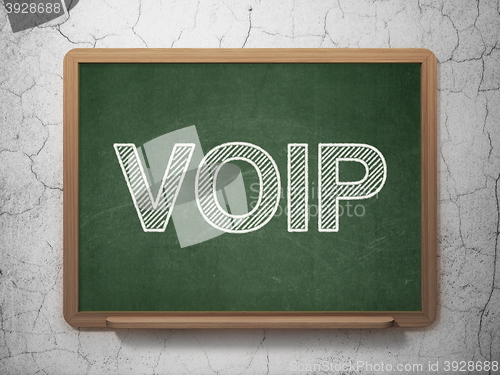 Image of Web development concept: VOIP on chalkboard background