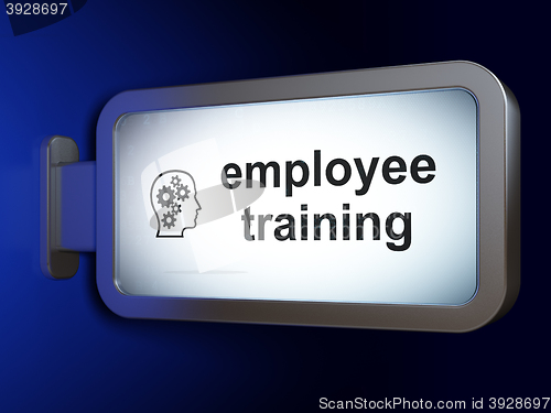 Image of Learning concept: Employee Training and Head With Gears on billboard background