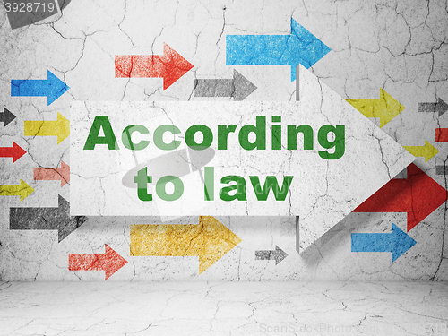 Image of Law concept: arrow with According To Law on grunge wall background