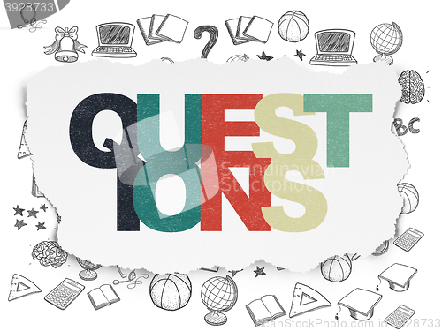 Image of Education concept: Questions? on Torn Paper background
