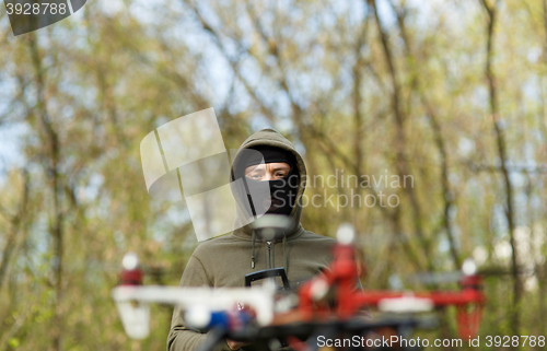 Image of Man flying with the drone