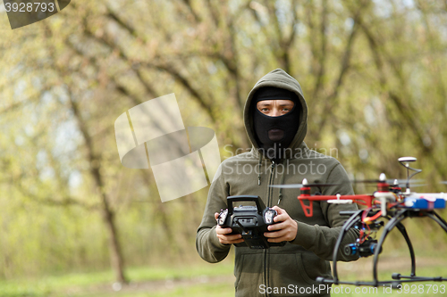 Image of Man flying with the drone