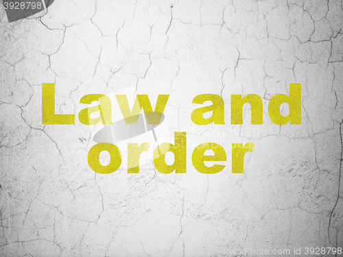 Image of Law concept: Law And Order on wall background