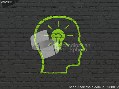 Image of Data concept: Head With Lightbulb on wall background