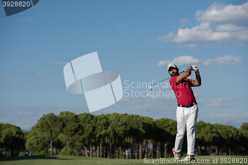 Image of golf player hitting long shot