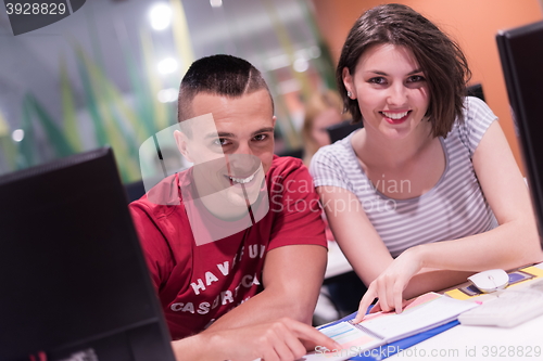 Image of technology students group working  in computer lab school  class