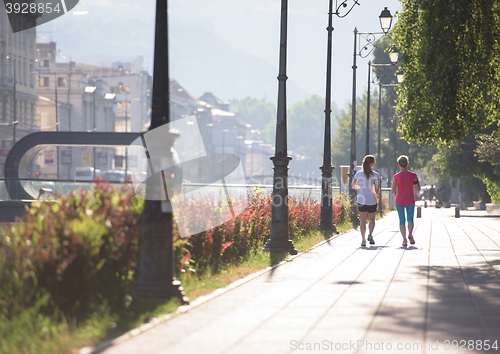 Image of female friends jogging