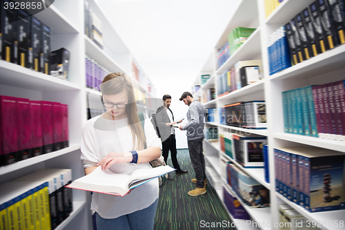 Image of students group  in school  library