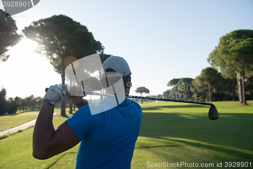 Image of golf player hitting shot