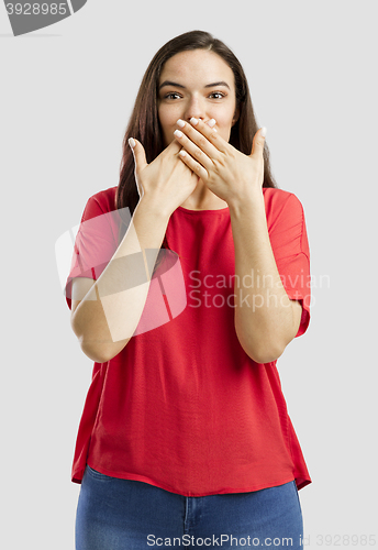 Image of Lovely woman with hands on mouth