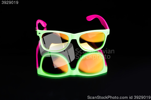 Image of colored sunglasses.