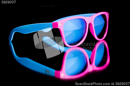 Image of colored sunglasses.