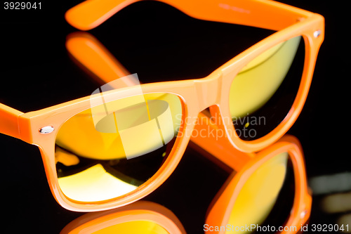 Image of colored sunglasses.