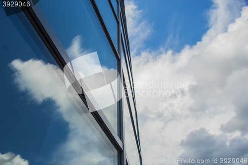 Image of window reflection dayligh as blue background