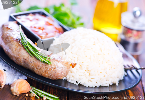 Image of boiled rice with sausages