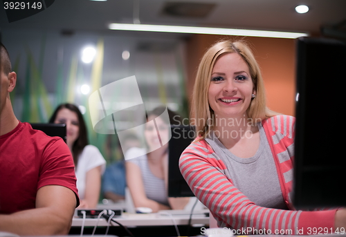 Image of technology students group working  in computer lab school  class