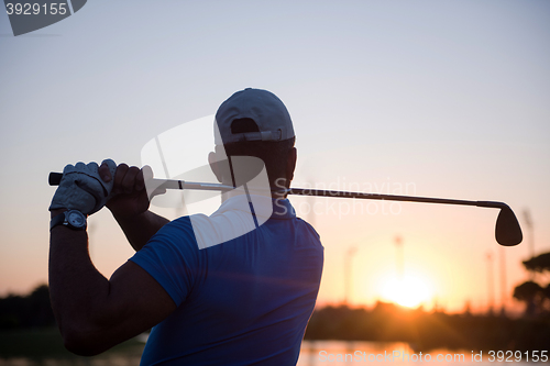 Image of golfer hitting long shot