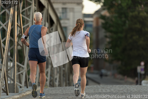 Image of couple jogging