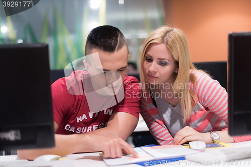 Image of technology students group working  in computer lab school  class
