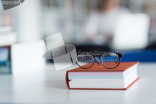 Image of female student study in school library