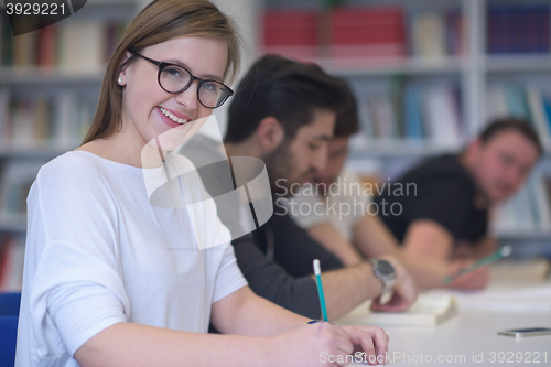 Image of group of students study together in classroom