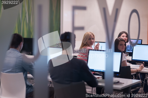 Image of technology students group working  in computer lab school  class