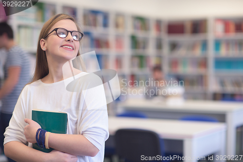 Image of portrait of female student in library