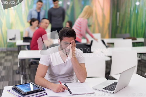 Image of male student in classroom