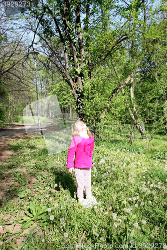 Image of Young girl in public park