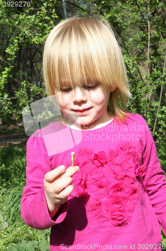 Image of Young girl in public park