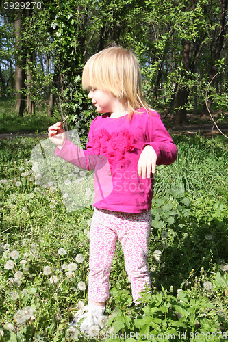 Image of Young girl in public park