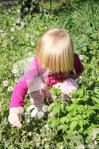 Image of Young girl in public park