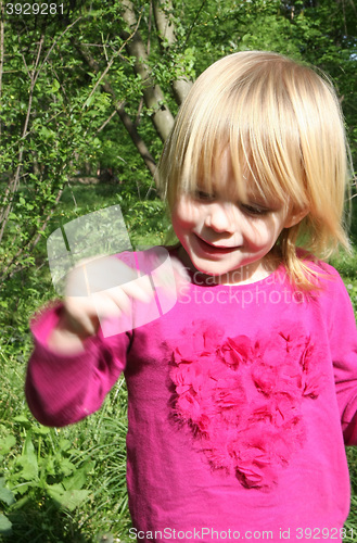 Image of Young girl in public park