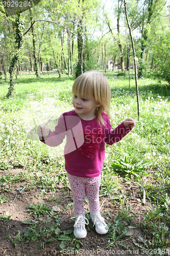 Image of Young girl in public park