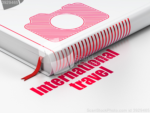 Image of Tourism concept: book Photo Camera, International Travel on white background