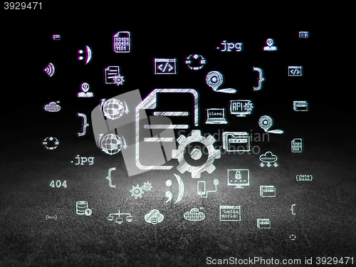 Image of Programming concept: Gear in grunge dark room