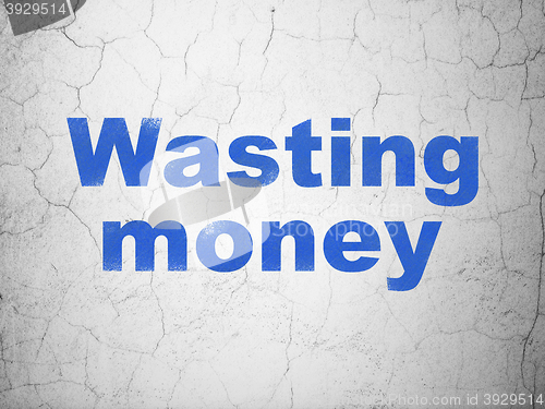 Image of Banking concept: Wasting Money on wall background