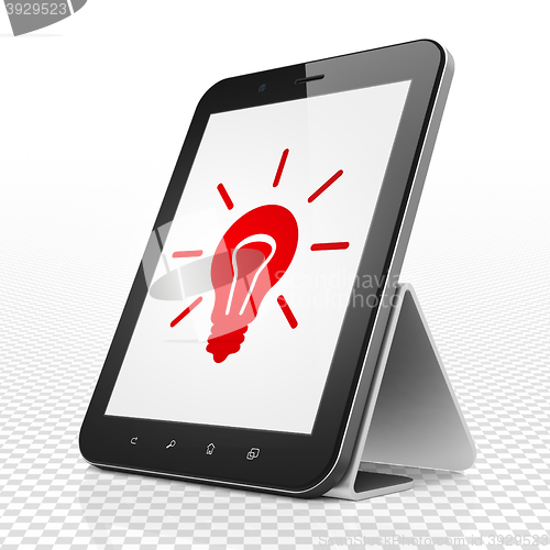 Image of Business concept: Tablet Computer with Light Bulb on display