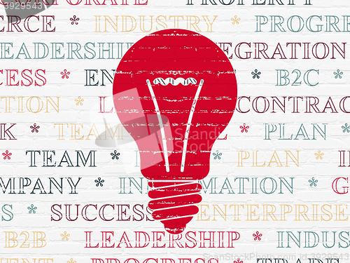 Image of Business concept: Light Bulb on wall background