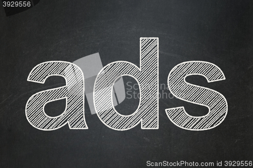 Image of Advertising concept: Ads on chalkboard background