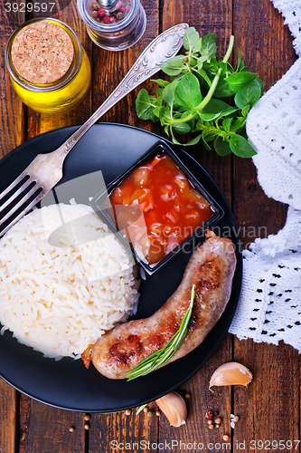 Image of boiled rice with sausages