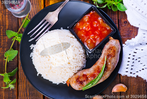 Image of boiled rice with sausages