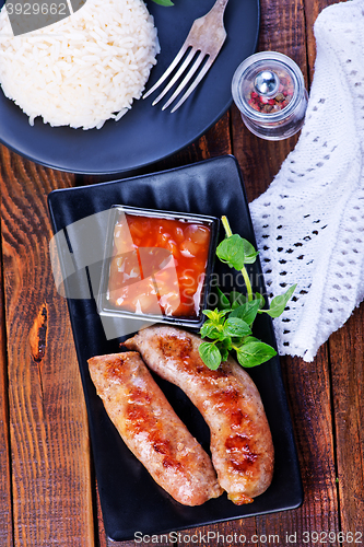 Image of boiled rice with sausages