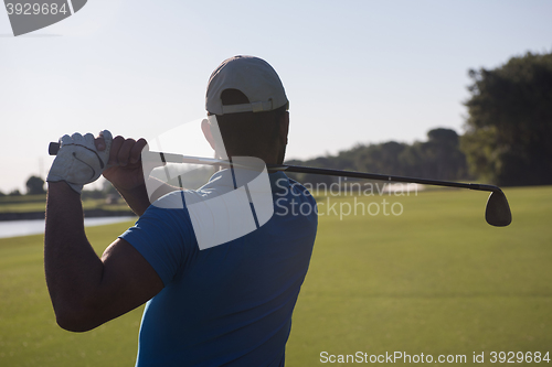 Image of golf player hitting shot