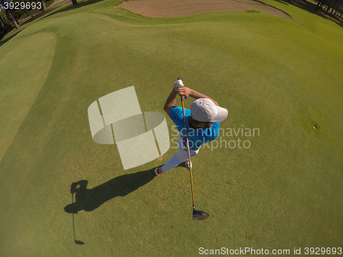 Image of top view of golf player hitting shot