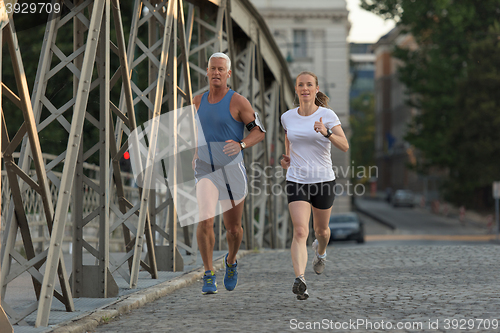 Image of couple jogging