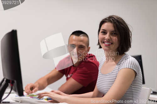 Image of technology students group working  in computer lab school  class