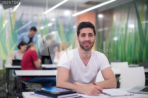 Image of male student in classroom