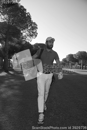 Image of golf player walking
