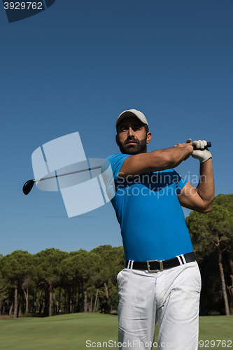 Image of golf player hitting shot